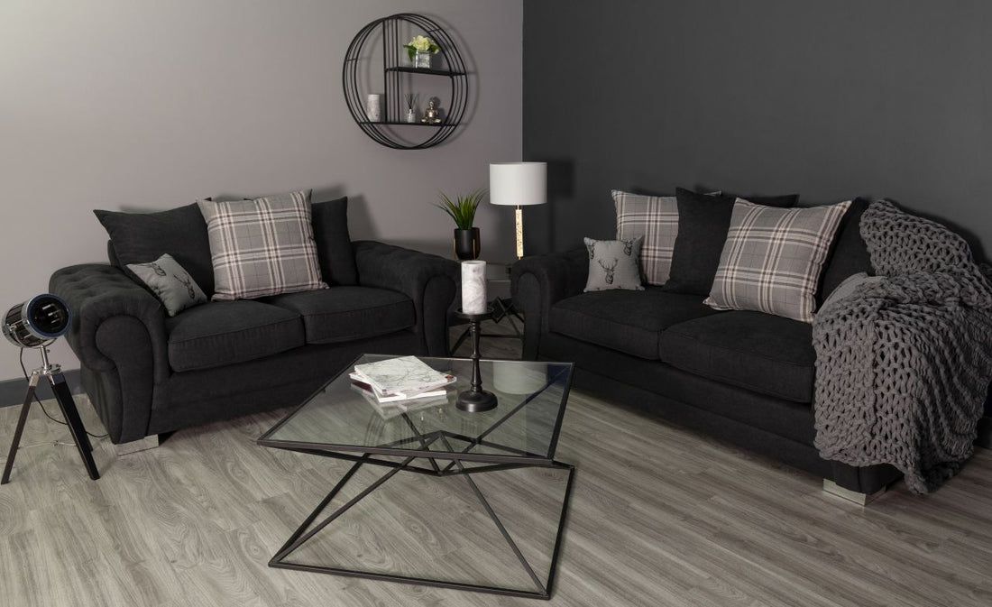 black sofa with matching pillows