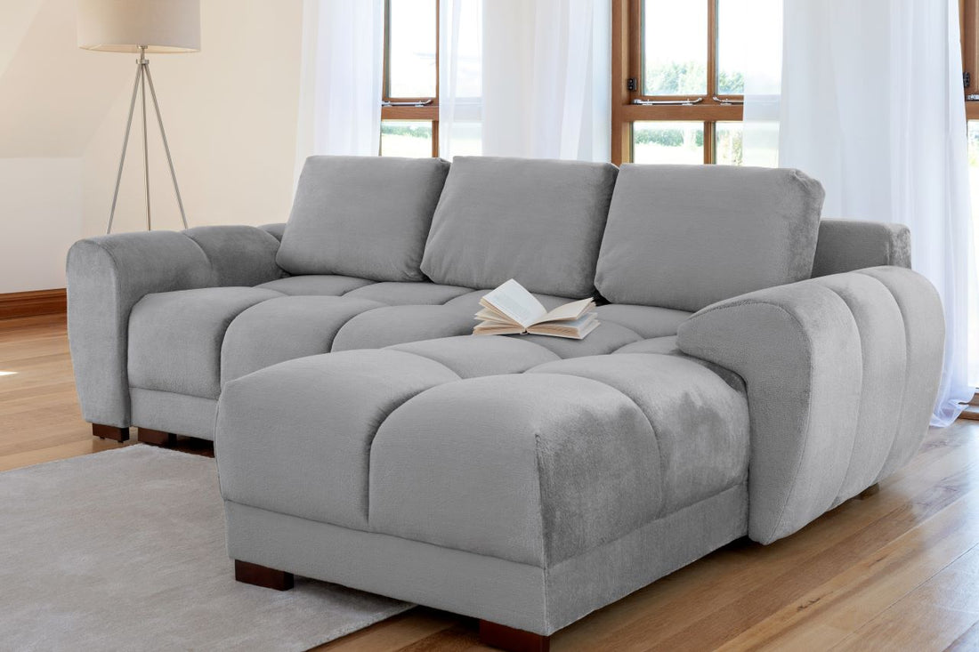 grey colored sofa bed