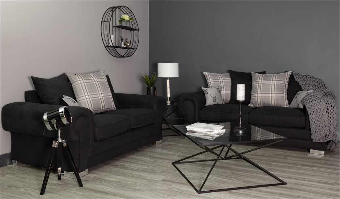 2 sets of black sofa beds