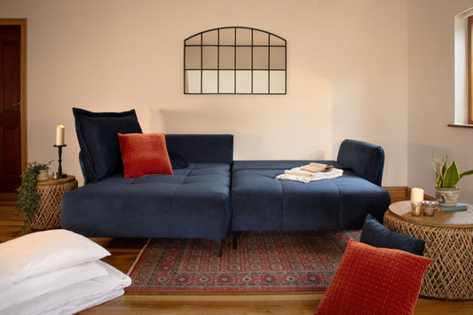 comfortable sofa bed with orage pillows