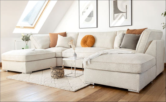 beige colored u shape sofa